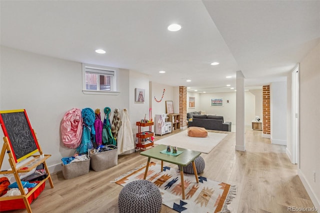 playroom featuring light hardwood / wood-style floors