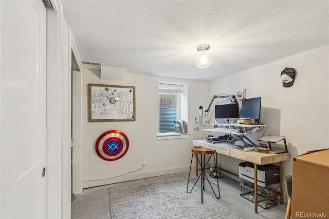 office area featuring a textured ceiling