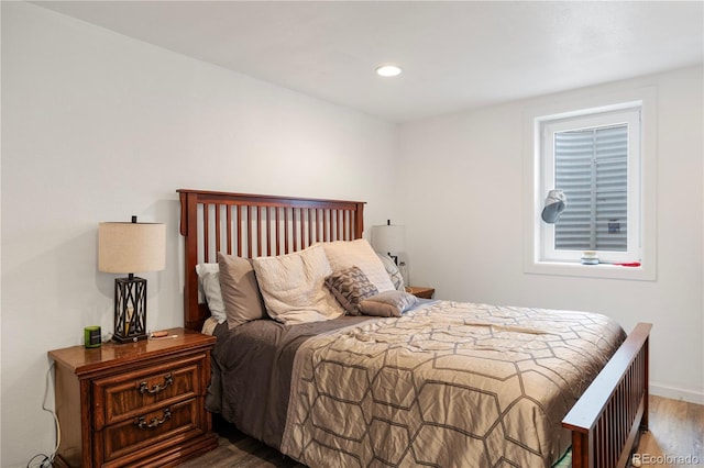 bedroom featuring recessed lighting, baseboards, and wood finished floors