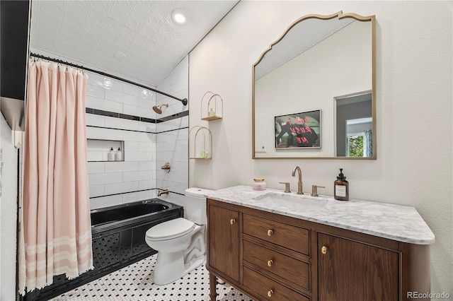 7767 S Depew St, Littleton, CO 80128 - full bath featuring shower / bath combo with shower curtain and vanity