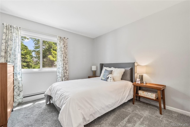 7767 S Depew St, Littleton, CO 80128 - bedroom with baseboard heating and carpet