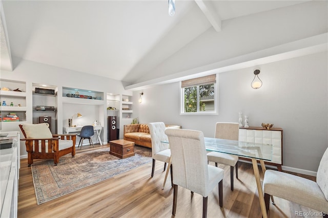 7767 S Depew St, Littleton, CO 80128 - dining area featuring light wood-style floors and built in shelves