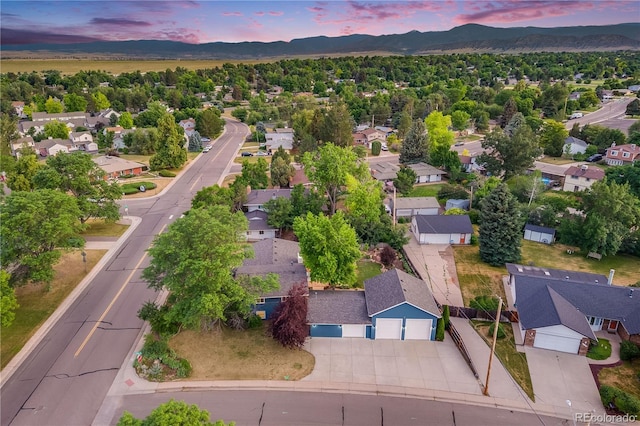 7767 S Depew St, Littleton, CO 80128 - aerial perspective of suburban area featuring a mountain backdrop