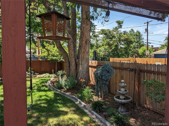 view of yard featuring fence