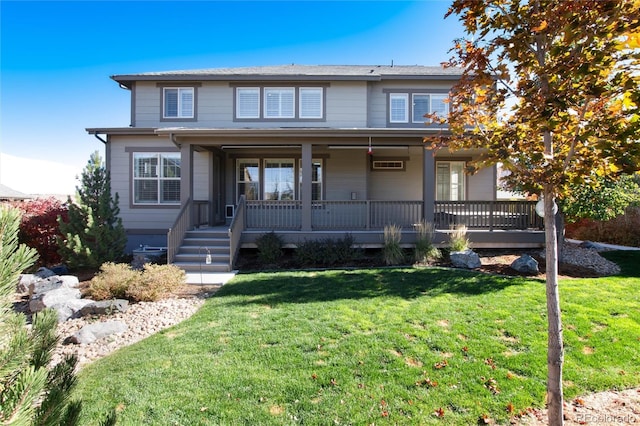 view of front of home featuring a porch and a front lawn