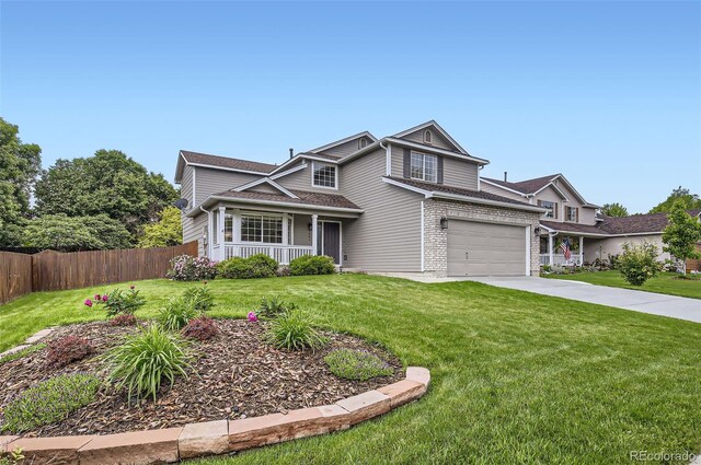 1641 Cedarwood Dr, Longmont, CO 80504 - traditional-style house with a porch, concrete driveway, a garage, and brick siding