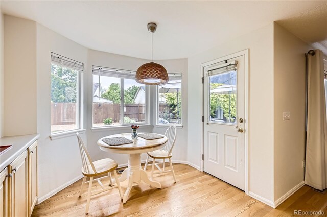 1641 Cedarwood Dr, Longmont, CO 80504 - dining space with light wood-style flooring and baseboards