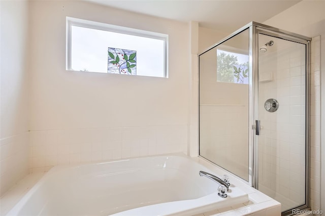 1641 Cedarwood Dr, Longmont, CO 80504 - bathroom featuring a bath and a stall shower