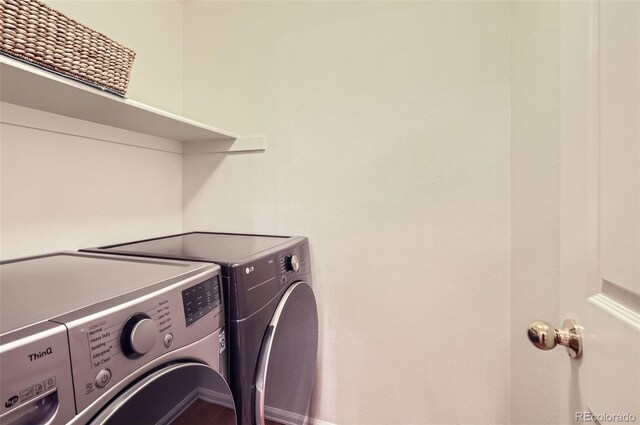 1641 Cedarwood Dr, Longmont, CO 80504 - laundry room with washer and dryer