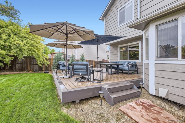 1641 Cedarwood Dr, Longmont, CO 80504 - wooden deck featuring outdoor dining area