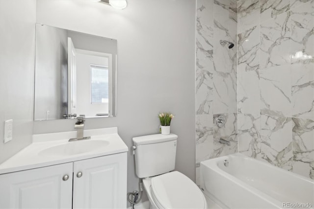 full bathroom featuring toilet, vanity, and tiled shower / bath combo