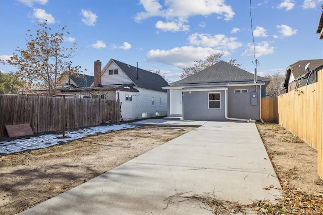 rear view of property with a patio