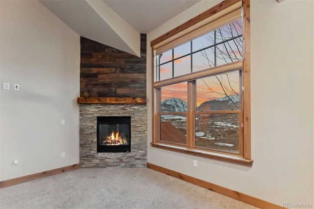 52 Buckskin Ln, Silverthorne, CO 80498 - unfurnished living room featuring carpet and a stone fireplace