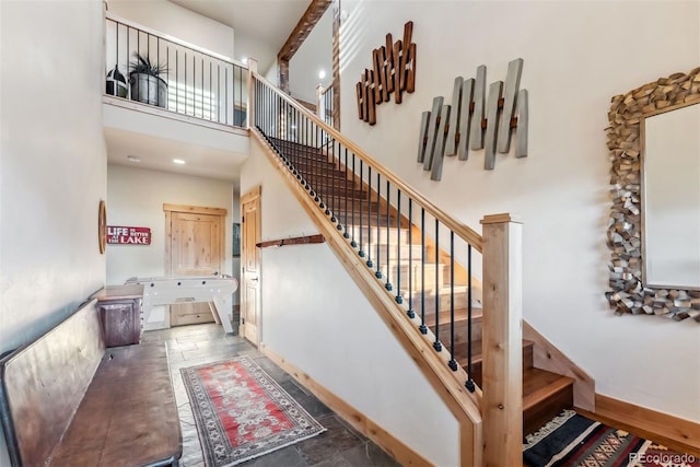 52 Buckskin Ln, Silverthorne, CO 80498 - stairs featuring stone tile flooring and a high ceiling