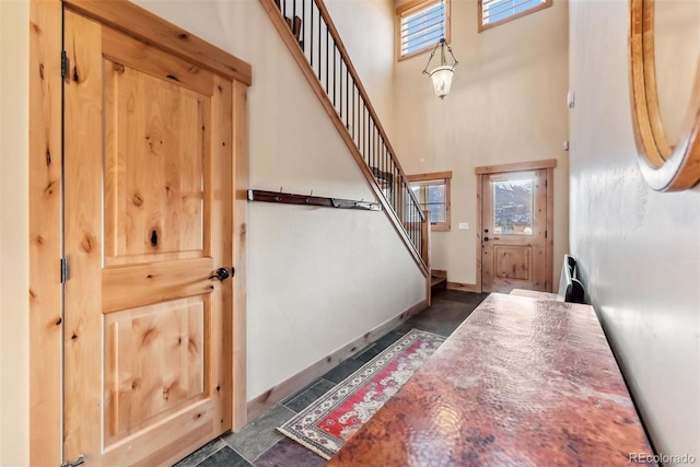 52 Buckskin Ln, Silverthorne, CO 80498 - entryway with stairway and a towering ceiling