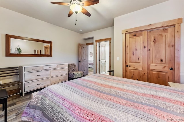 52 Buckskin Ln, Silverthorne, CO 80498 - bedroom with dark wood-type flooring, a closet, and a ceiling fan