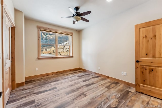 52 Buckskin Ln, Silverthorne, CO 80498 - unfurnished bedroom featuring wood finished floors and ceiling fan