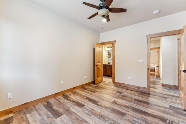 52 Buckskin Ln, Silverthorne, CO 80498 - unfurnished bedroom with light wood finished floors, ensuite bathroom, and ceiling fan