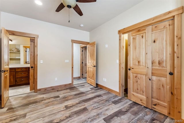 52 Buckskin Ln, Silverthorne, CO 80498 - unfurnished bedroom with light wood-style floors, recessed lighting, a ceiling fan, and ensuite bath