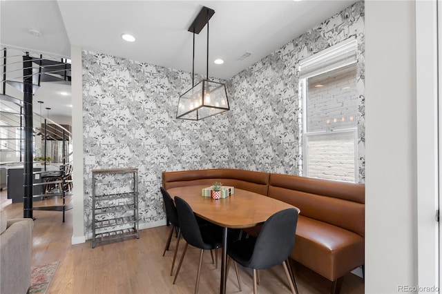 3443 Lawrence St, Denver, CO 80205 - dining area featuring wood finished floors, recessed lighting, and a chandelier