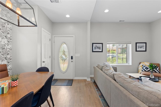 3443 Lawrence St, Denver, CO 80205 - entryway with light wood finished floors and recessed lighting
