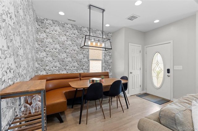 3443 Lawrence St, Denver, CO 80205 - foyer featuring wood finished floors, plenty of natural light, and recessed lighting