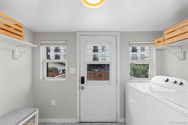 3443 Lawrence St, Denver, CO 80205 - washroom with washing machine and clothes dryer and baseboards