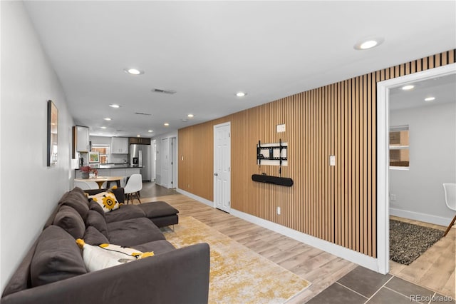 3443 Lawrence St, Denver, CO 80205 - living room with wood finished floors and recessed lighting