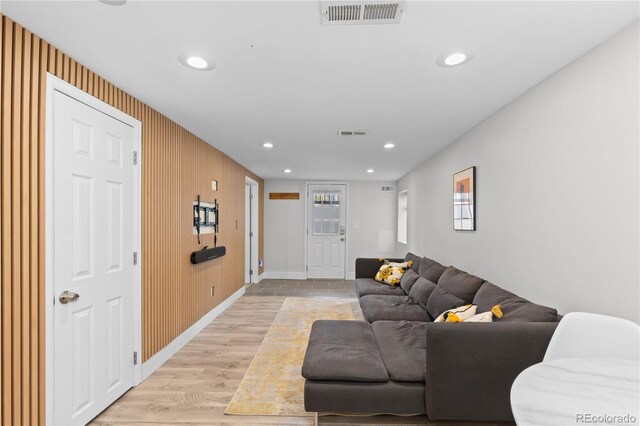 3443 Lawrence St, Denver, CO 80205 - living area featuring light wood-type flooring and recessed lighting