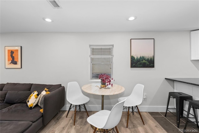 3443 Lawrence St, Denver, CO 80205 - dining room with wood finished floors and recessed lighting
