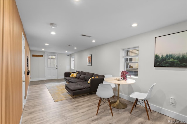 3443 Lawrence St, Denver, CO 80205 - living room with light wood-type flooring and recessed lighting