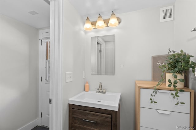 3443 Lawrence St, Denver, CO 80205 - bathroom with vanity and baseboards