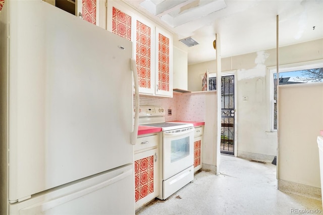 kitchen featuring open shelves, white appliances, light countertops, decorative backsplash, and visible vents