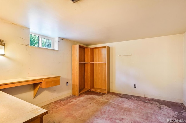 basement featuring baseboards