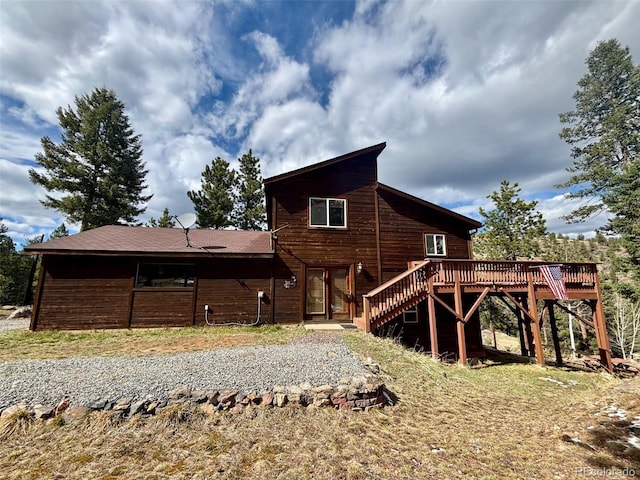 33508 Persistence Ave, Pine, CO 80470 - back of property featuring stairway and a deck