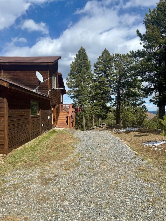33508 Persistence Ave, Pine, CO 80470 - view of property exterior with gravel driveway