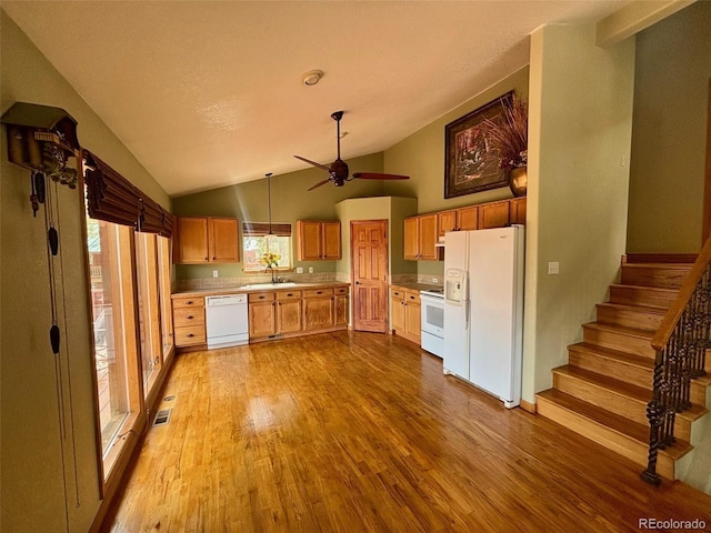 33508 Persistence Ave, Pine, CO 80470 - kitchen featuring white appliances, vaulted ceiling, dark wood-type flooring, light countertops, and ceiling fan