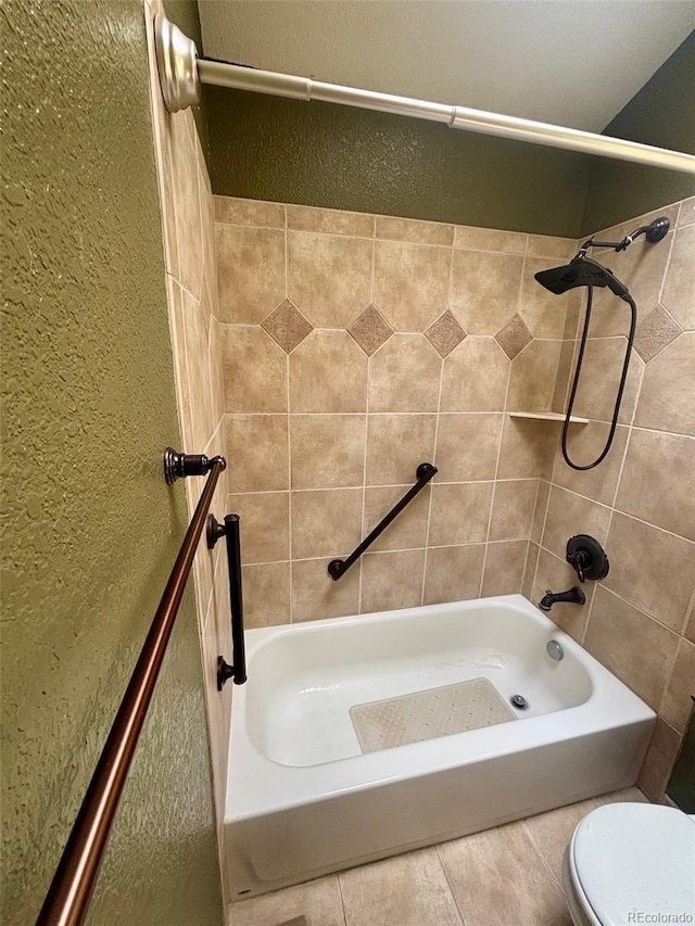 33508 Persistence Ave, Pine, CO 80470 - bathroom featuring a textured wall and bathtub / shower combination