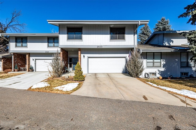 view of front of property featuring a garage