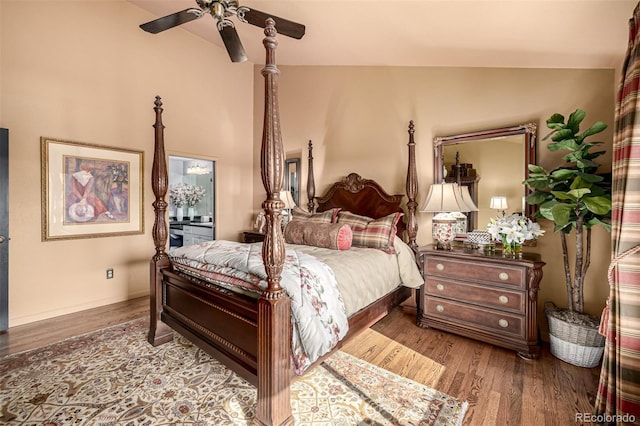 bedroom with vaulted ceiling, ceiling fan, and light hardwood / wood-style floors