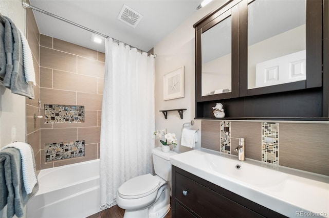 1482 S Pitkin Cir, Aurora, CO 80017 - bathroom featuring decorative backsplash, vanity, and shower / bath combination with curtain