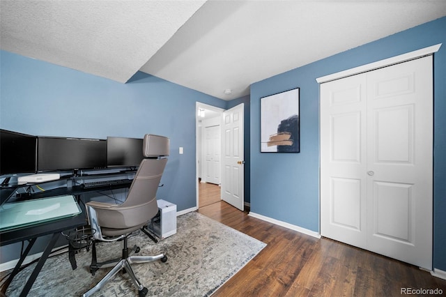 1482 S Pitkin Cir, Aurora, CO 80017 - office with baseboards and dark wood-style floors