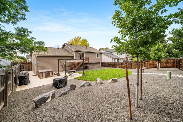 1482 S Pitkin Cir, Aurora, CO 80017 - rear view of property with a patio area and a fenced backyard