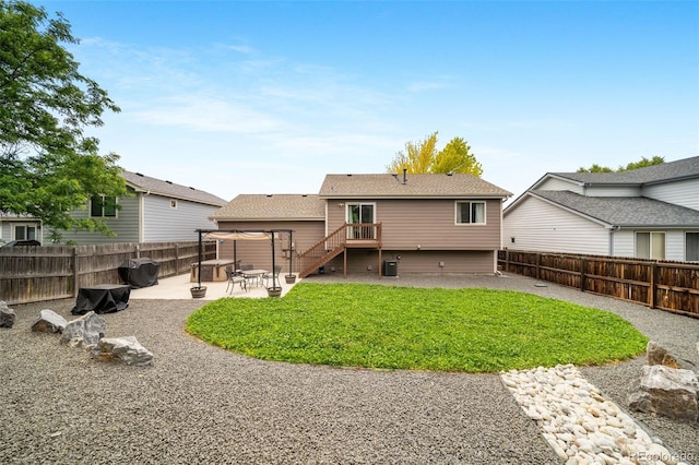 1482 S Pitkin Cir, Aurora, CO 80017 - back of house featuring a patio and a fenced backyard