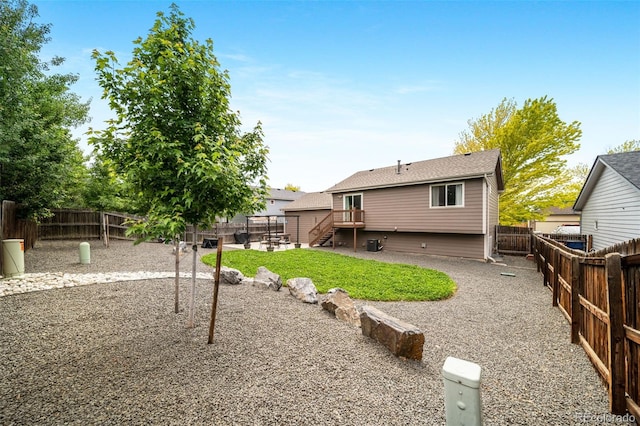 1482 S Pitkin Cir, Aurora, CO 80017 - rear view of property with a fenced backyard and a patio