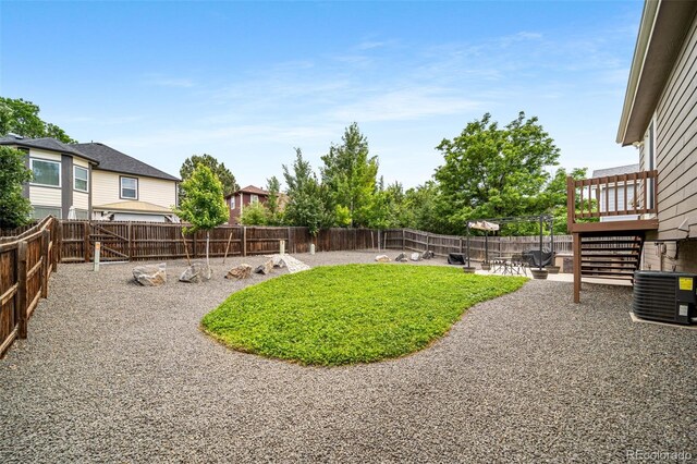 1482 S Pitkin Cir, Aurora, CO 80017 - fenced backyard with a patio and stairs