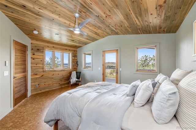 551 Spade Pl, Jefferson, CO 80456 - bedroom with access to outside, wooden ceiling, vaulted ceiling, wooden walls, and ceiling fan