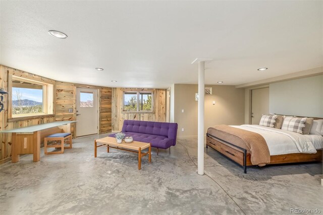 551 Spade Pl, Jefferson, CO 80456 - bedroom with unfinished concrete floors and recessed lighting