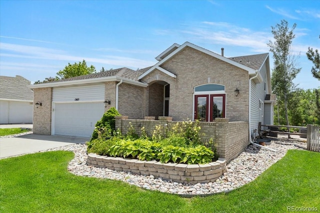 12671 Home Farm Ln, Westminster, CO 80234 - view of front of house featuring brick siding, an attached garage, driveway, and a shingled roof