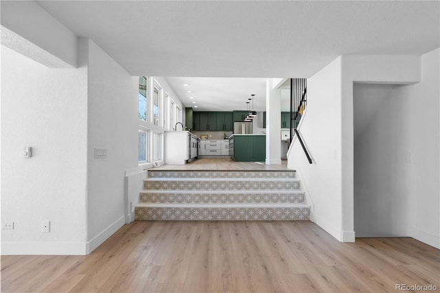 staircase featuring hardwood / wood-style flooring